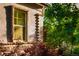 Exterior of house highlighting a window and decorative brickwork at 3231 Oak St, Wheat Ridge, CO 80033