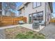 Backyard featuring patio seating and a glass door and window to the house at 4457 Wyandot St, Denver, CO 80211