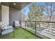 Outdoor balcony features artificial turf and chairs, perfect for relaxing at 4457 Wyandot St, Denver, CO 80211