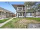 Modern home featuring a manicured lawn and beautiful balconies at 4457 Wyandot St, Denver, CO 80211