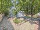 Backyard with patio and a well-maintained garden at 17284 E Hawksbead Dr, Parker, CO 80134