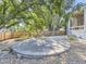 Landscaped backyard with patio area and wooden fence at 17284 E Hawksbead Dr, Parker, CO 80134