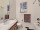 Traditional bathroom with tile flooring, shower, vanity, and towel racks at 17284 E Hawksbead Dr, Parker, CO 80134
