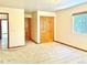 Inviting bedroom with plush carpet, ample closet space, and a sunlit window for a peaceful retreat at 19850 Indian Summer Ln, Monument, CO 80132