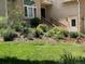 Charming home exterior with a well-manicured lawn and a garden at 19850 Indian Summer Ln, Monument, CO 80132