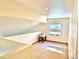 Upstairs loft with carpet flooring, dormer windows, neutral colors, and natural light at 19850 Indian Summer Ln, Monument, CO 80132