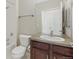 Bathroom shows single sink vanity with a toilet and bathtub at 13598 Via Varra # 105, Broomfield, CO 80020