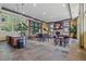 Spacious community room featuring a fireplace, comfortable seating, and plenty of natural light at 13598 Via Varra # 105, Broomfield, CO 80020
