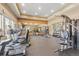 Well-equipped fitness center with modern cardio machines, weight training equipment, and a mirrored wall at 13598 Via Varra # 105, Broomfield, CO 80020