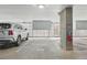 Assigned parking spot in a well-lit parking garage at 13598 Via Varra # 105, Broomfield, CO 80020