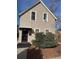 Charming two-story home with a well-maintained front yard and inviting entrance at 2469 Ames St, Edgewater, CO 80214