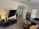 Comfortable living room featuring carpeted floors, and plenty of natural light at 2469 Ames St, Edgewater, CO 80214