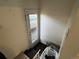 Stairwell from the back door leading to an outdoor area at 2469 Ames St, Edgewater, CO 80214