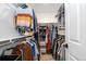 Well-organized walk-in closet with ample storage, shelving, and clothing racks at 10254 Worchester St, Commerce City, CO 80022