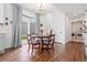Dining room with access to backyard and a view of the adjacent laundry area at 10254 Worchester St, Commerce City, CO 80022