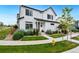 Charming two-story home featuring a well-manicured lawn and tasteful landscaping at 10254 Worchester St, Commerce City, CO 80022