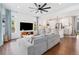Bright and open living room with a comfortable sofa and modern decor at 10254 Worchester St, Commerce City, CO 80022