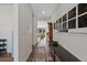 Stylish entryway featuring hardwood floors, an antique clock, and decorative wall accents at 24432 E Tennessee Pl, Aurora, CO 80018