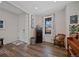 Inviting living room with hardwood floors, natural light, and a cozy seating area at 24432 E Tennessee Pl, Aurora, CO 80018