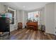Bright living room with a grand piano, stylish curtains, and comfortable seating at 24432 E Tennessee Pl, Aurora, CO 80018