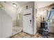 Entryway with tile flooring, staircase, coat hooks, and rustic decor at 9674 Fox Den Dr, Littleton, CO 80125