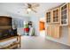 Well-lit storage room with ceiling fan, bright walls and ample storage space at 9674 Fox Den Dr, Littleton, CO 80125