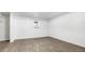 Well-lit basement bedroom with neutral walls and durable flooring offers a versatile space for relaxation and personalization at 555 Everett St, Lakewood, CO 80226
