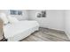 Serene bedroom featuring a comfortable bed and serene natural light at 555 Everett St, Lakewood, CO 80226