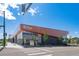 Retail shopping complex features modern architectural design and street-front parking at 84 Spruce St # 707, Denver, CO 80230