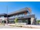 Modern retail building with contemporary design, glass storefronts, and outdoor seating at 84 Spruce St # 707, Denver, CO 80230