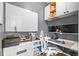 Efficient home office with modern decor, dual monitors, a printer, and ample storage space at 84 Spruce St # 707, Denver, CO 80230