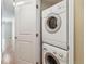 Stackable washer and dryer conveniently located in the hallway at 1330 Elizabeth St # 8, Denver, CO 80206
