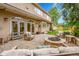 Backyard patio with stone fireplace and outdoor seating at 2558 Premier Pl, Boulder, CO 80304