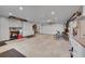 Well-organized garage with epoxy floors, lots of cabinet storage, overhead lighting, and bike racks at 2558 Premier Pl, Boulder, CO 80304
