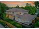 Home exterior with an open patio, manicured lawn, privacy fence, and a spacious backyard at 2558 Premier Pl, Boulder, CO 80304