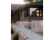 Charming home exterior showcases a well-manicured front yard and modern architectural details at 199 S Ivy St, Denver, CO 80224