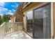 Private balcony with sliding glass door access and view of the surrounding area at 7335 E Quincy Ave # 303, Denver, CO 80237