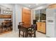 Bright eat-in kitchen with updated appliances and tile flooring at 12906 Cherry Way, Thornton, CO 80241