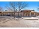 Community clubhouse with stone accents, covered entry and well-maintained landscaping offers a welcoming atmosphere at 3751 W 136Th Ave # S3, Broomfield, CO 80023