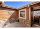 Patio area with stone accents and privacy from surrounding homes at 3751 W 136Th Ave # S3, Broomfield, CO 80023