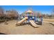 Community playground featuring multiple slides, climbing structures, and a soft landing surface for enjoyment at 3751 W 136Th Ave # S3, Broomfield, CO 80023