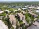 An aerial of the condo complex, showcasing its prime location and landscaping at 3470 S Poplar St. # 110, Denver, CO 80224