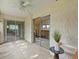 Open-air outdoor balcony with adjacent sliding glass doors to the interior at 3470 S Poplar St. # 110, Denver, CO 80224