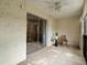 Spacious outdoor balcony with brick walls and a sitting area at 3470 S Poplar St. # 110, Denver, CO 80224