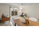 Inviting living room with sliding glass doors to the balcony and neutral decor at 3470 S Poplar St. # 110, Denver, CO 80224