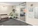 Lobby area with glass doors, bench seating, and secure mailboxes, creating a welcoming and secure entrance at 3470 S Poplar St. # 110, Denver, CO 80224