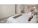 Comfortable bedroom with neutral décor and natural light at 3470 S Poplar St. # 110, Denver, CO 80224