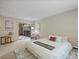 Serene main bedroom with sliding glass door access to the balcony at 3470 S Poplar St. # 110, Denver, CO 80224