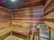Warm wood sauna featuring built-in benches and a heater, providing a private relaxation space at 3470 S Poplar St. # 110, Denver, CO 80224