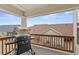 Covered deck, with a grill, and a view of the neighborhood at 7560 S Biloxi Ct, Aurora, CO 80016